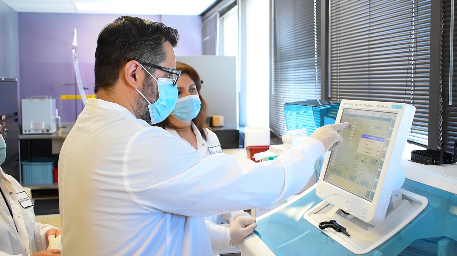 Laboratory team preparing blood products for clinical trial support